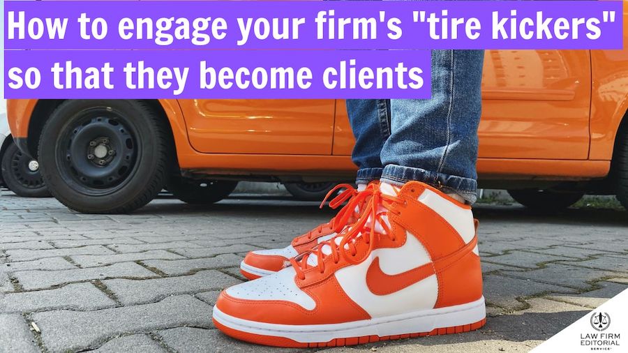 Image of person standing near tires of a car looking ready to kick them