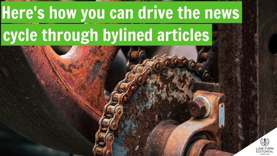 A photo of gears to signify driving the news cycle through bylined articles