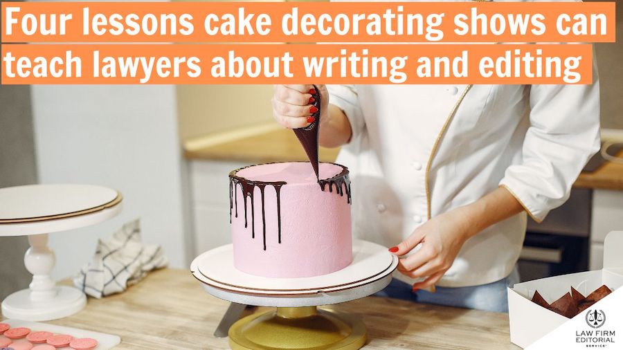 Person decorating a pink cake